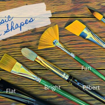 7 Paintbrushes on a wood background