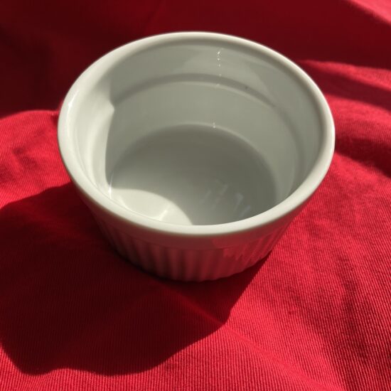 Wjie Ramekin on a red background